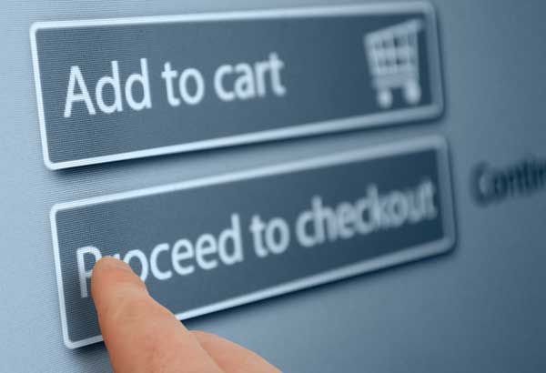 Online shopper adding to basket and purchasing products on ecommerce store